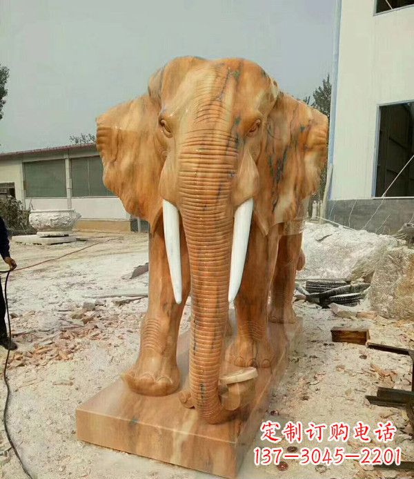 徐州鼻卷如意晚霞红招财大象石雕