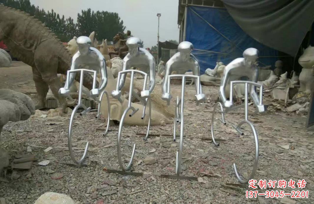 徐州不锈钢广场抽象骑自行车人物雕塑