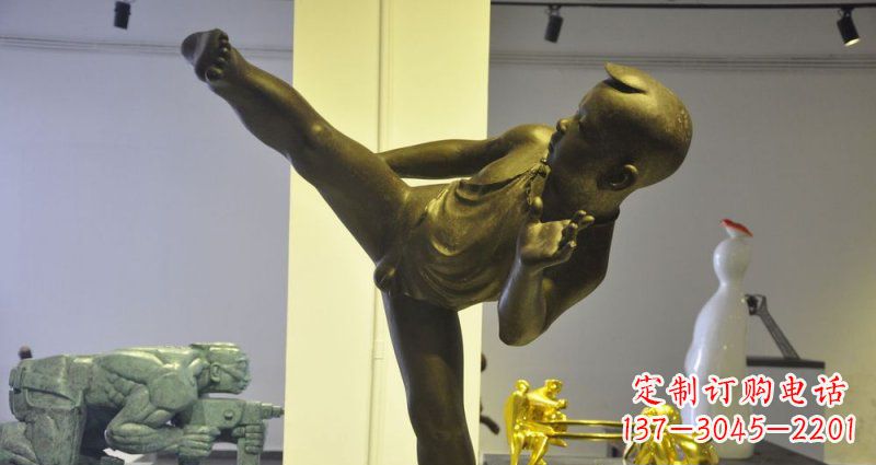 徐州领雕塑男孩练功夫铜雕