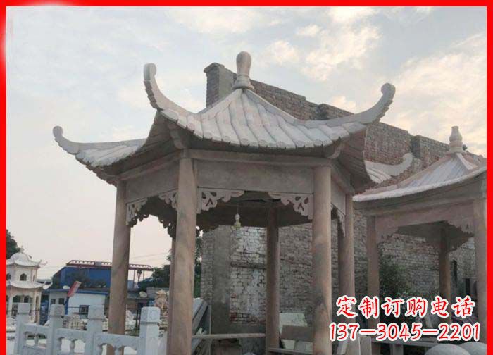 徐州公园晚霞红六角石雕凉亭