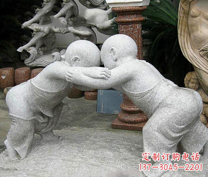 徐州可爱小孩摔跤石雕