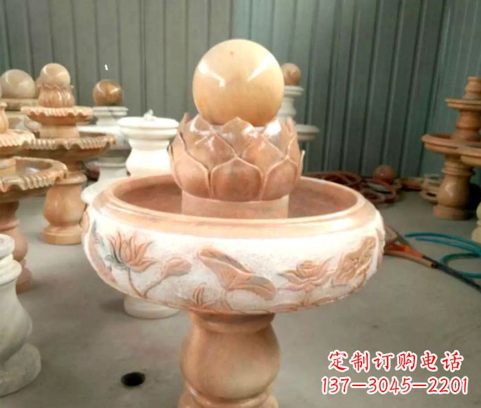 徐州石来运转晚霞红风水球喷泉石雕