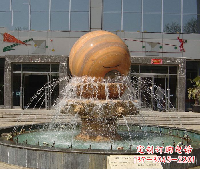 徐州石来运转球晚霞红风水球石雕