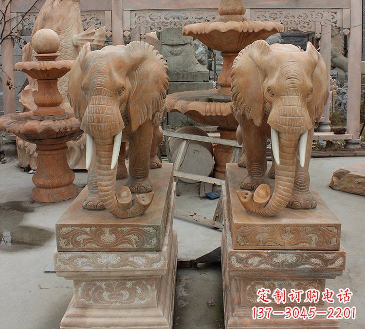 徐州晚霞红石雕元宝大象