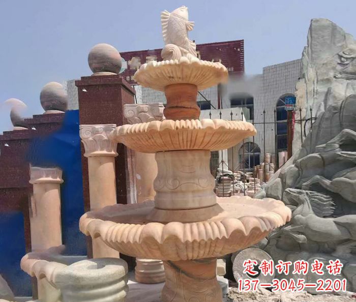 徐州园林景观晚霞红鲤鱼喷泉石雕