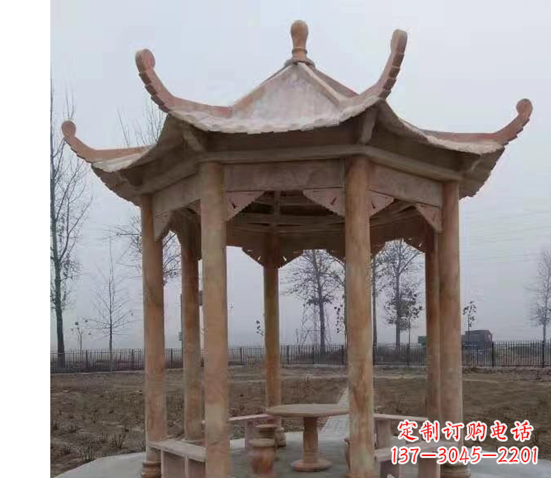 徐州公园晚霞红八角石雕凉亭